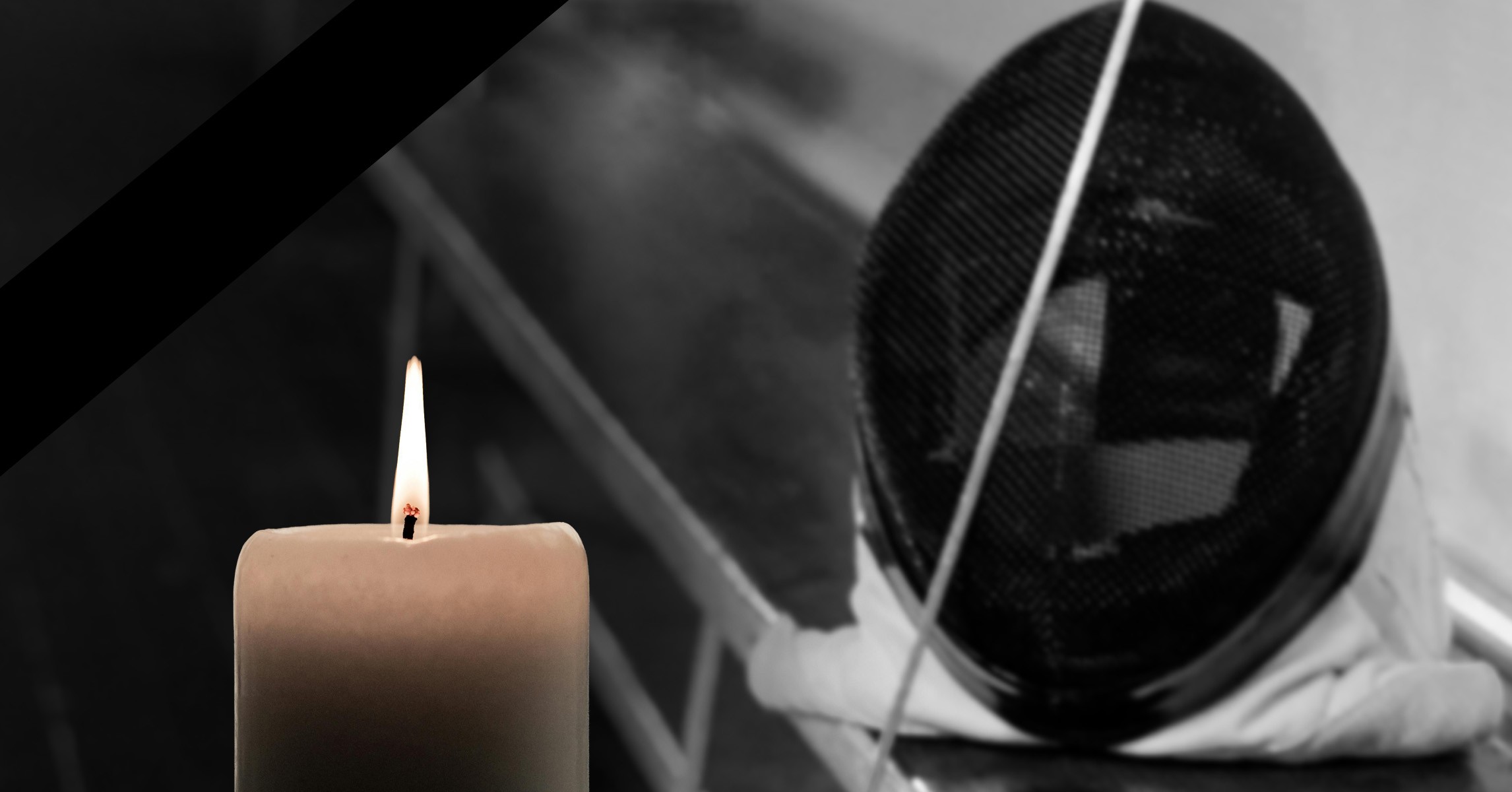 Trauer im Fechtsport – brennende Kerze und Fechtmaske als Symbolbild für Fechten und Abschied