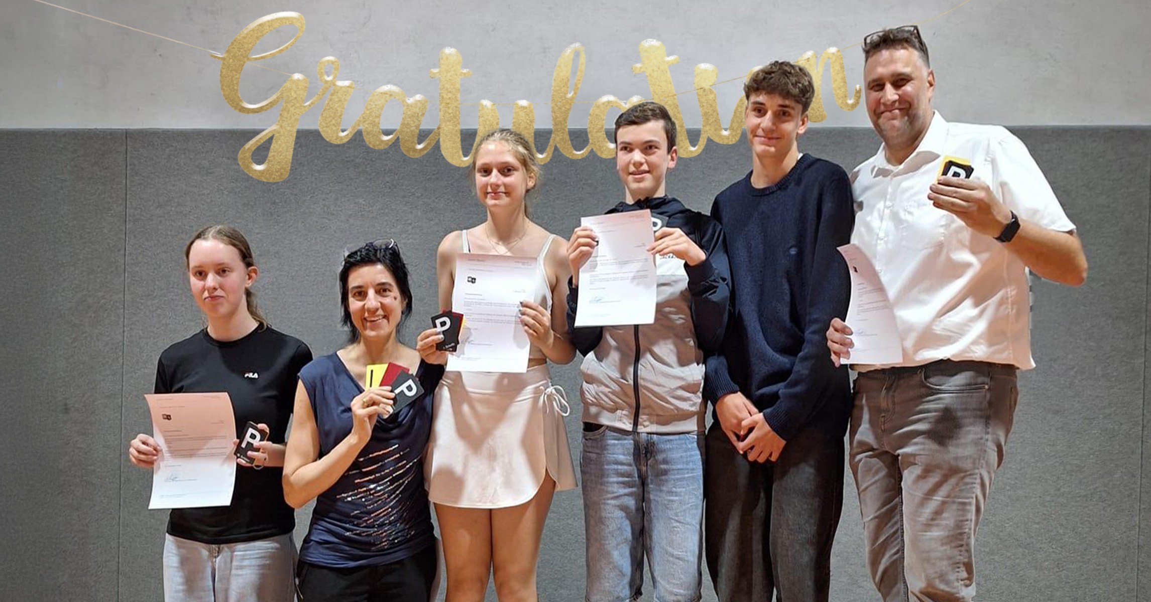 Gruppe von Kampfrichter:innen mit Urkunden am 6.9.2025