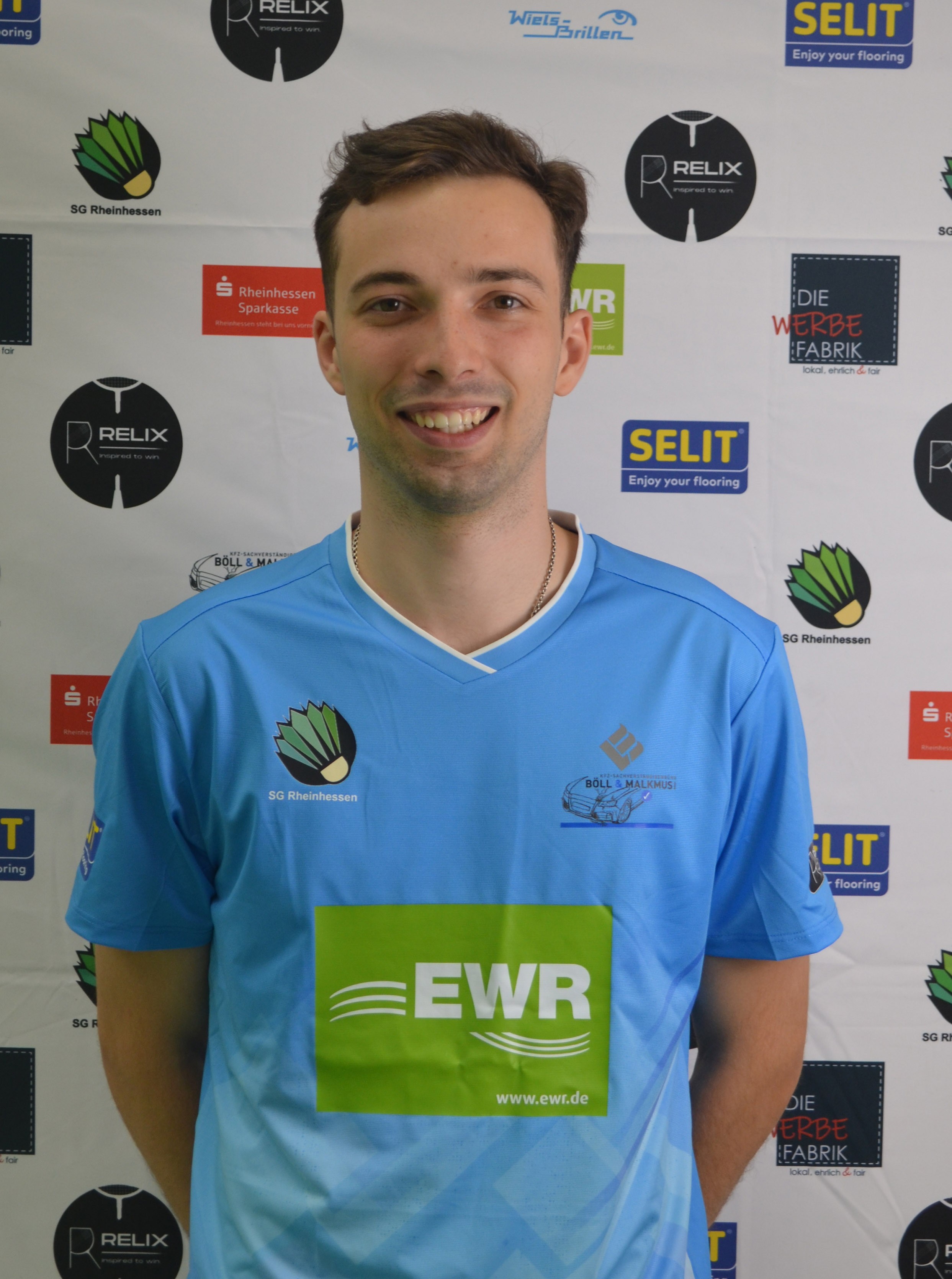 Skrynnik im Trikot der SG Rheinhessen mit Sponsorenlogos EWR und SELIT