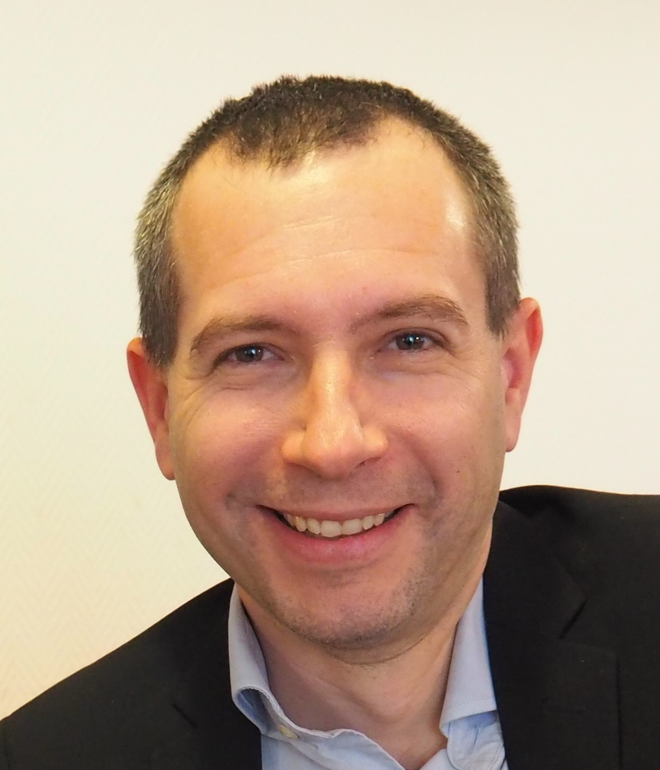 Porträtfoto von Dr. Christoph Augner