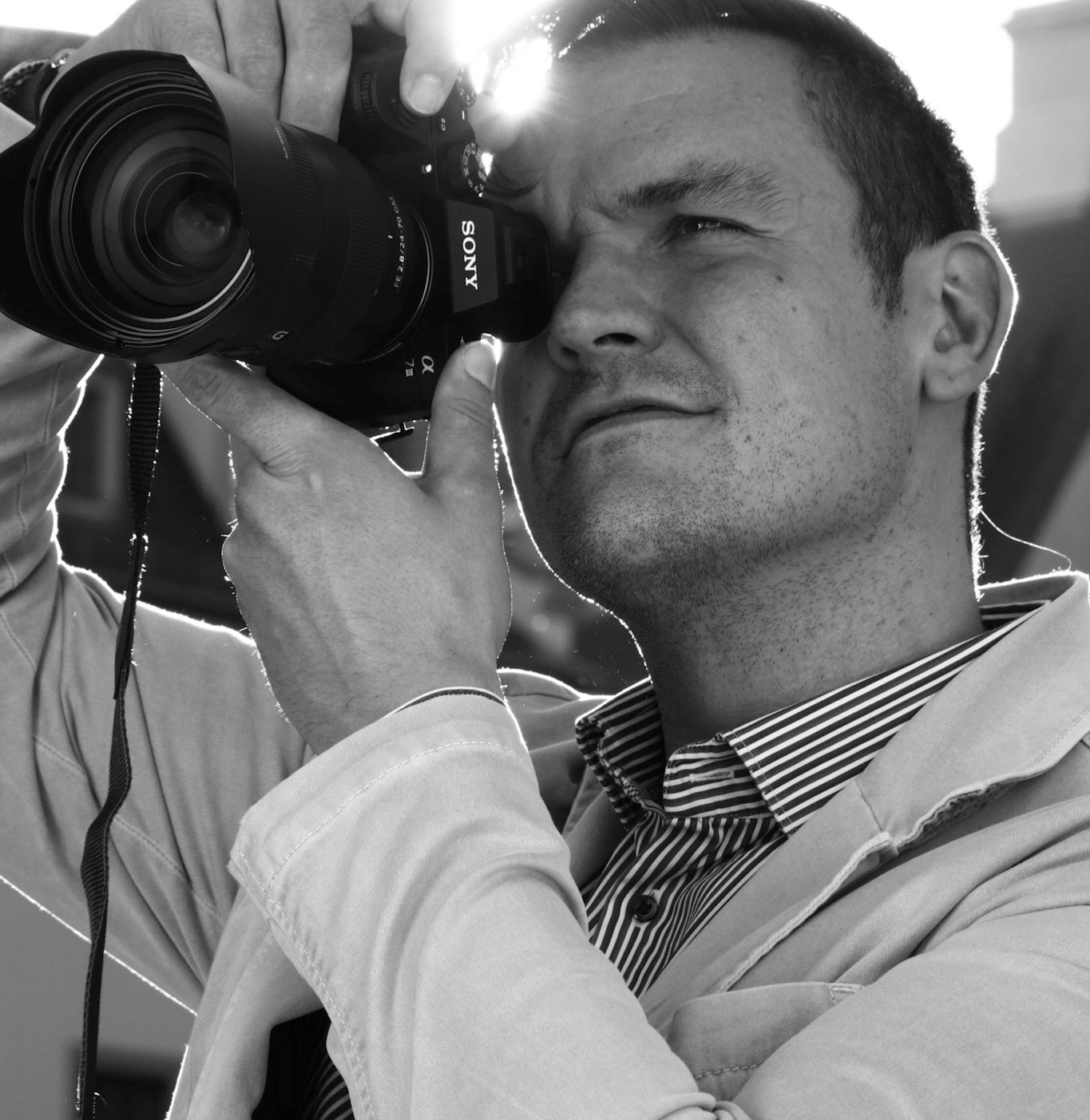 Porträt von Stefan Gericke als Fotograf mit Kamera