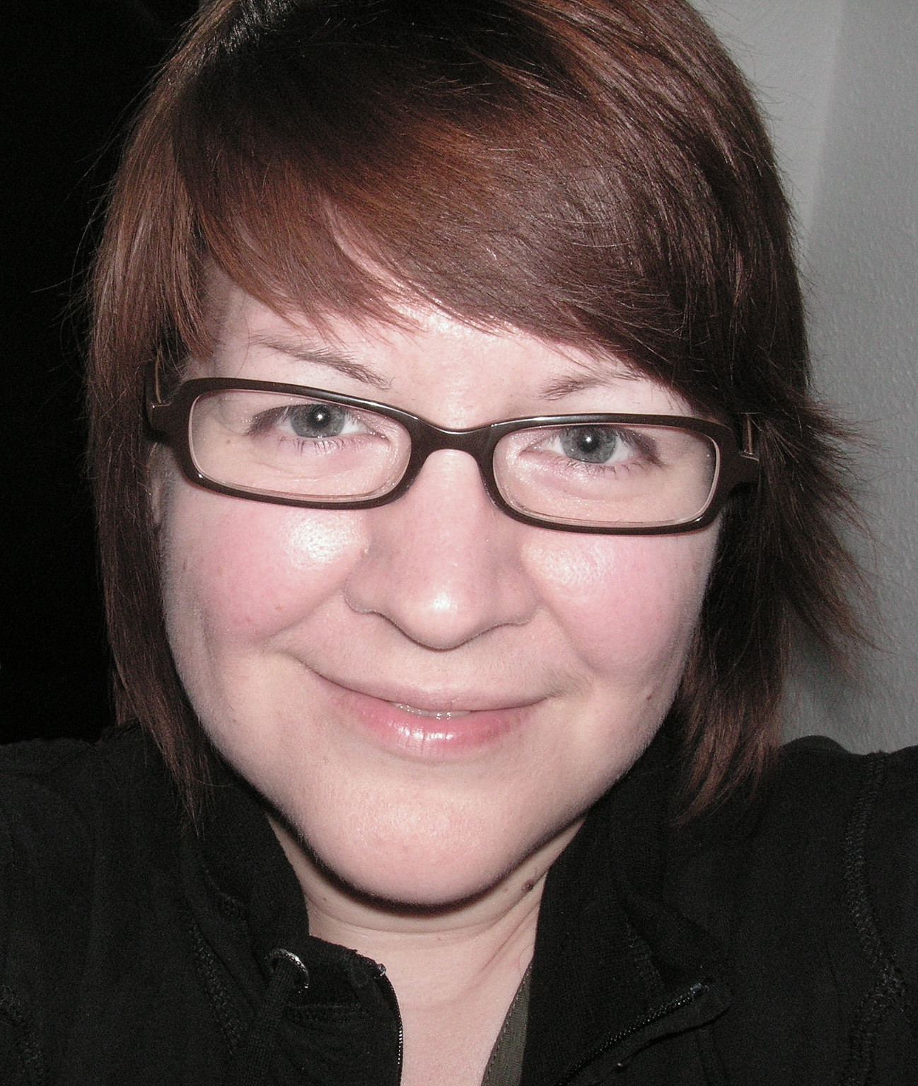 Porträtfoto von Schaefer Janke mit Brille und braunen Haaren