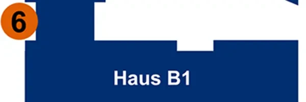 Schild mit der Aufschrift Haus B1 auf blauem Hintergrund