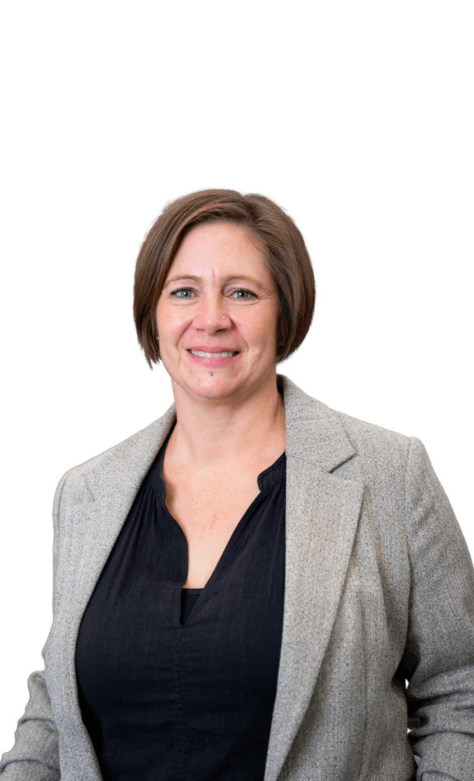 251217 NGR neu freigestellt zugeschnitten Portrait einer Person mit grauem Blazer vor schwarzem Hintergrund