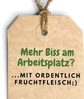 Schild mit Aufschrift 'Mehr Biss am Arbeitsplatz? ...mit ordentlich Fruchtfleisch;)'