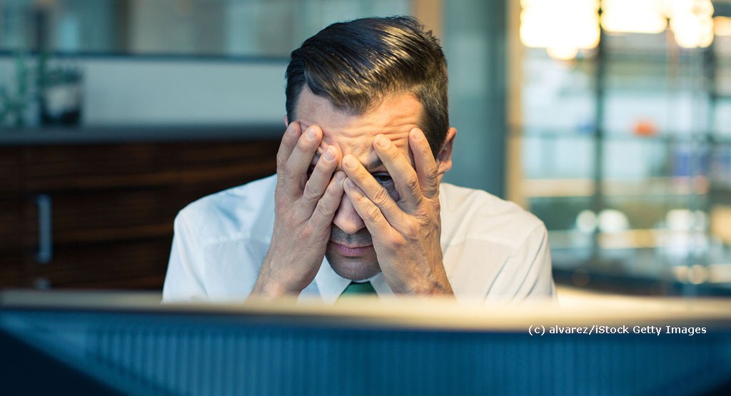 Prostata Hilfe Deutschland: Illustrationsbild Arbeitsfähigkeit - Gestresster Mann im Büro