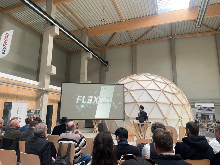 Vortrag beim 5. Leipziger Holzbautag im HWTK mit Präsentation zu Forschung, Lehre und Experimenten im Holzbau