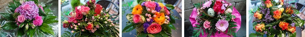 Bunte Blumensträuße mit Rosen, gelben und violetten Blüten