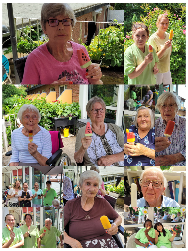 Senioren beim Eisessen im Garten einer Pflegeeinrichtung im Sommer Senioren genießen Eis im Garten einer Pflegeeinrichtung an einem Sommertag