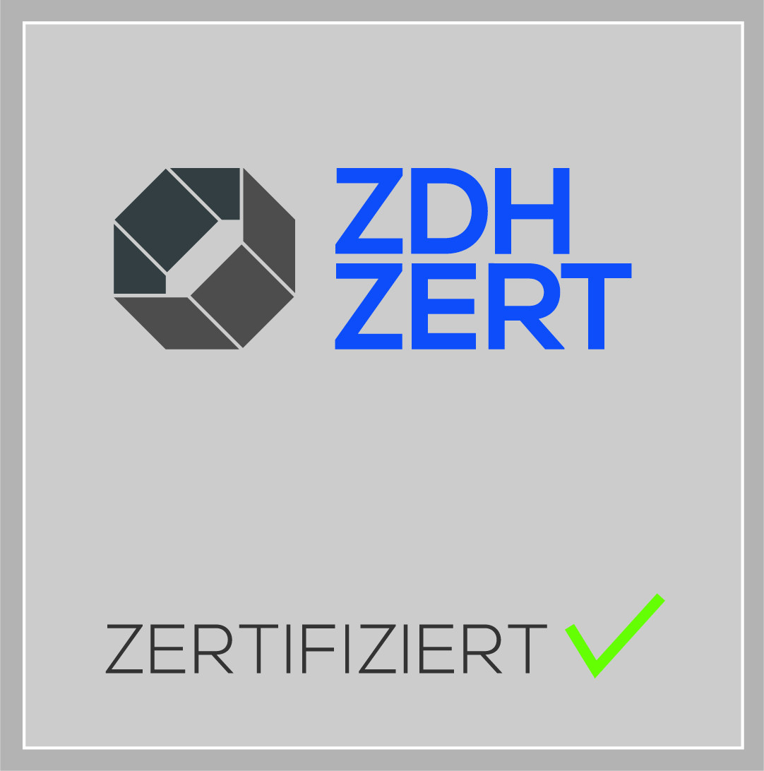 ZDH-ZERT zertifiziert Siegel mit Logo und Häkchen auf grauem Hintergrund