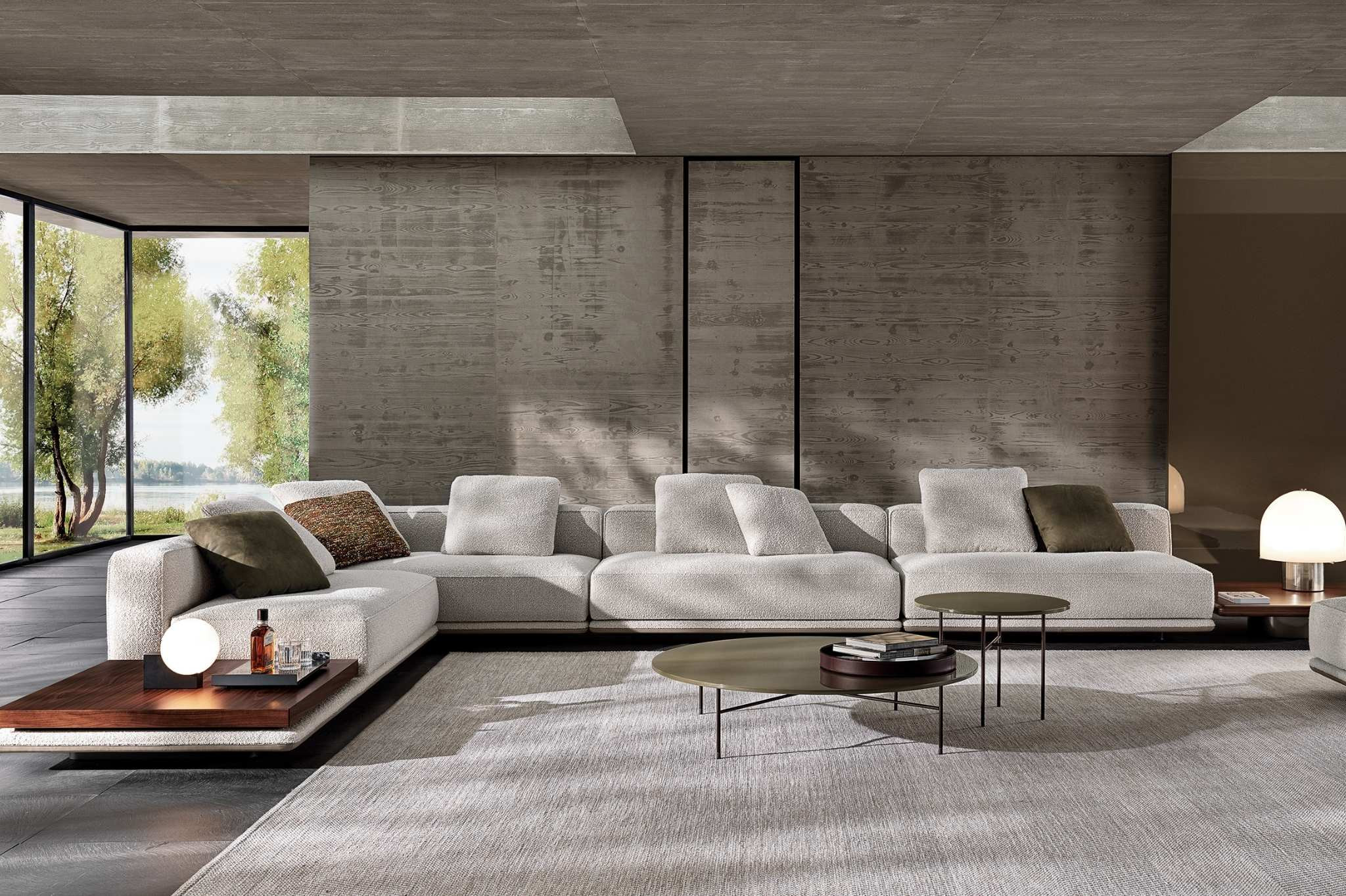 Steinhoff Aufmacher – Modernes Wohnzimmer mit Designer-Sofa und stilvollen Tischen Steinhoff Aufmacher: Modernes Wohnzimmer mit eleganter Couch und Couchtischen