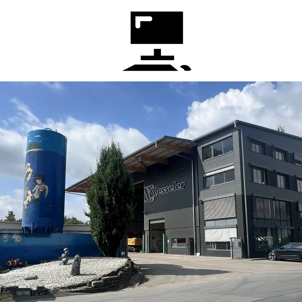 EDV Symbol und modernes Firmengebäude von Wesseler mit bemaltem Silo