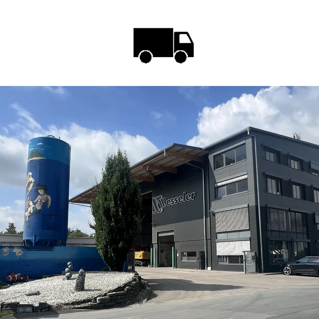 Spedition Gebäude mit Wesseler Logo und bemaltem Silo vor blauem Himmel