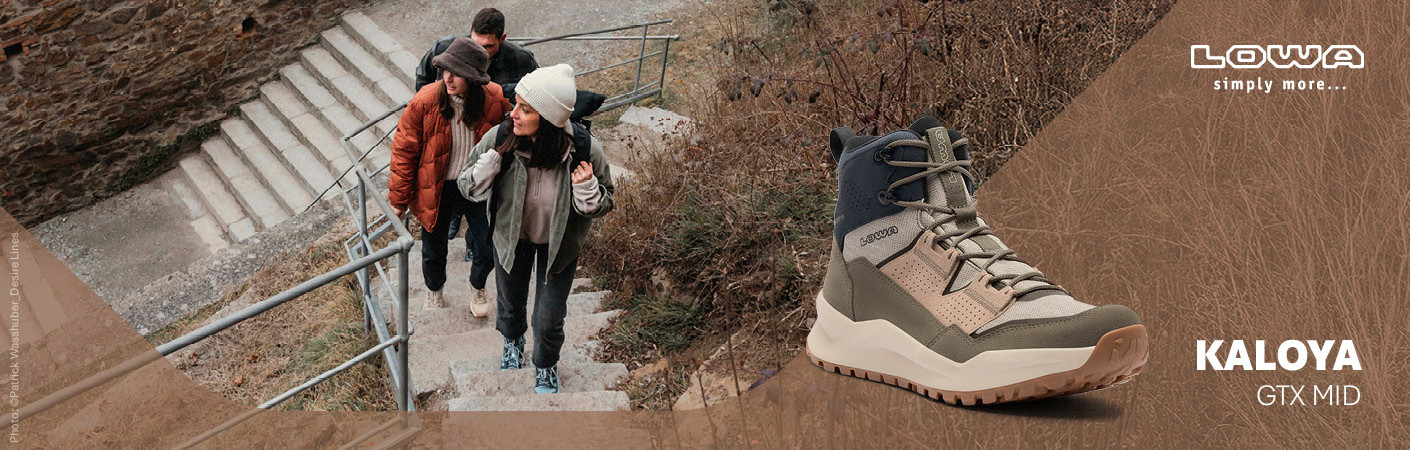 LOWA Wanderschuhe im Einsatz: Outdoor-Themenbild mit Wanderern LOWA Wanderschuhe beim Outdoor-Einsatz – Gruppenwanderung auf steinigem Pfad