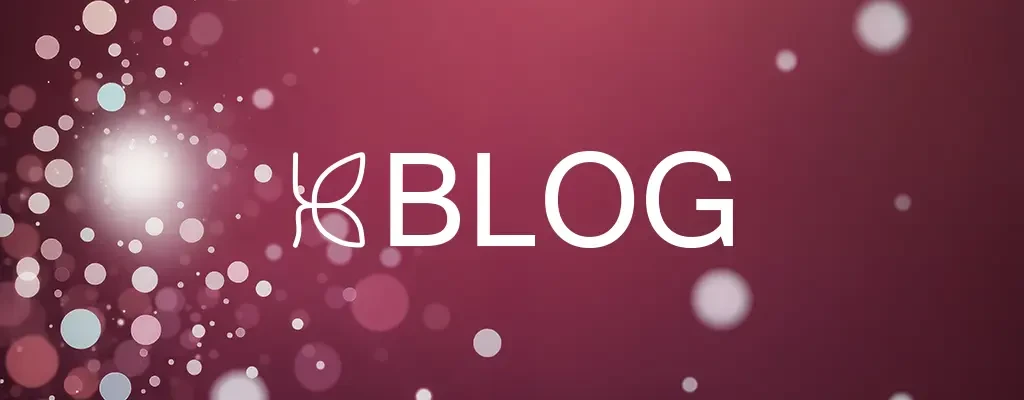 Grafik mit dem Schriftzug 'BLOG' auf rotem Hintergrund mit Bokeh-Effekt